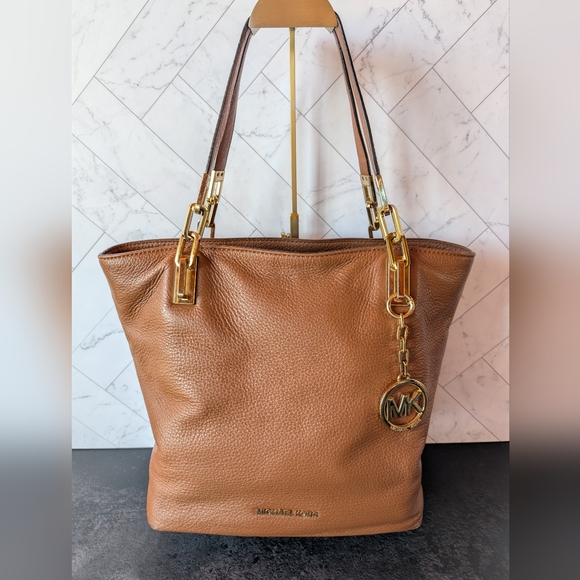 Michael Kors Handbags - Michael Kors Brown Pebbled Leather Tote with Gold MK Charm